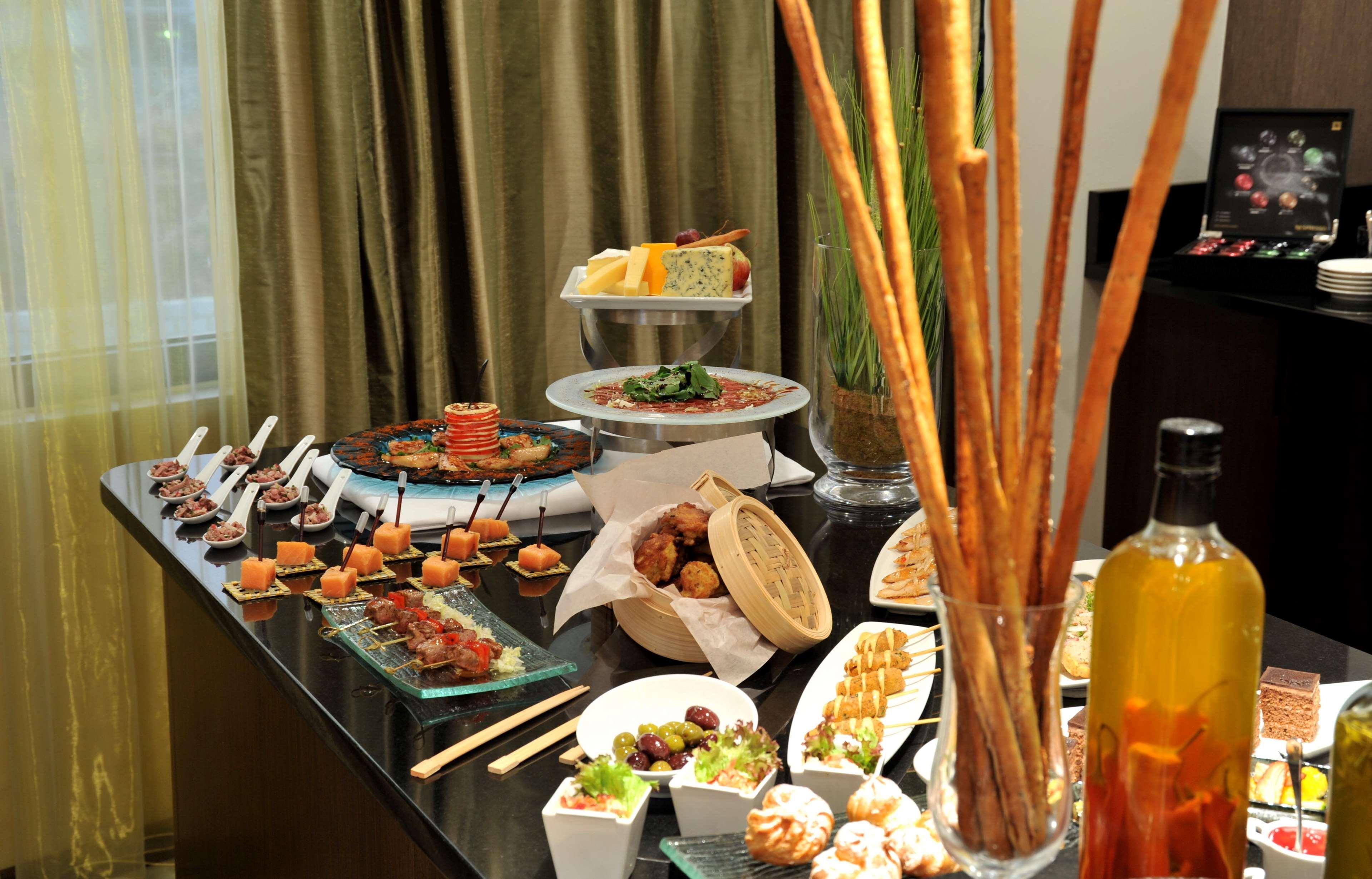 Radisson Blu Hotel Lusaka Exterior photo A buffet of tapas