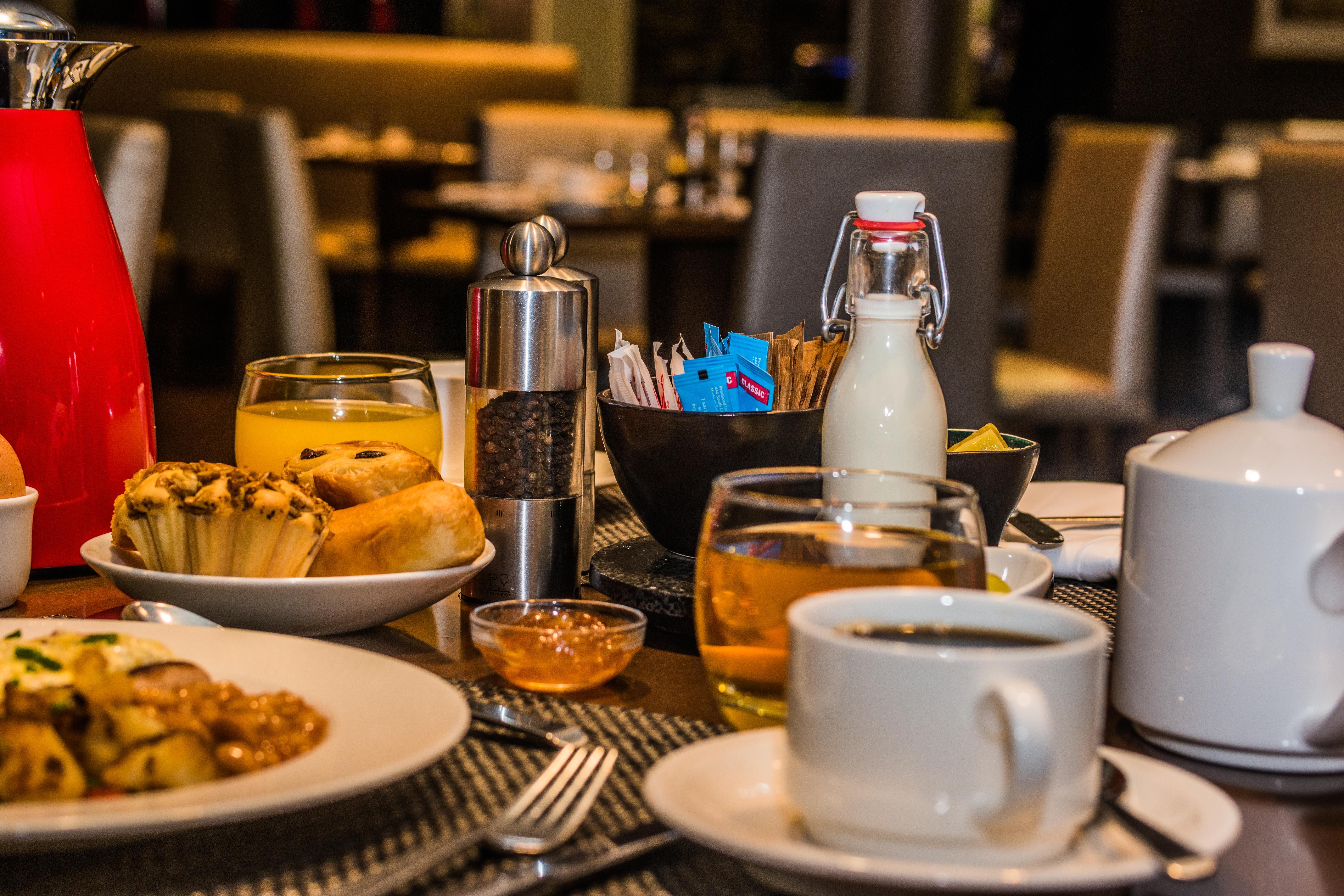 Radisson Blu Hotel Lusaka Exterior photo A restaurant table with a coffee cup