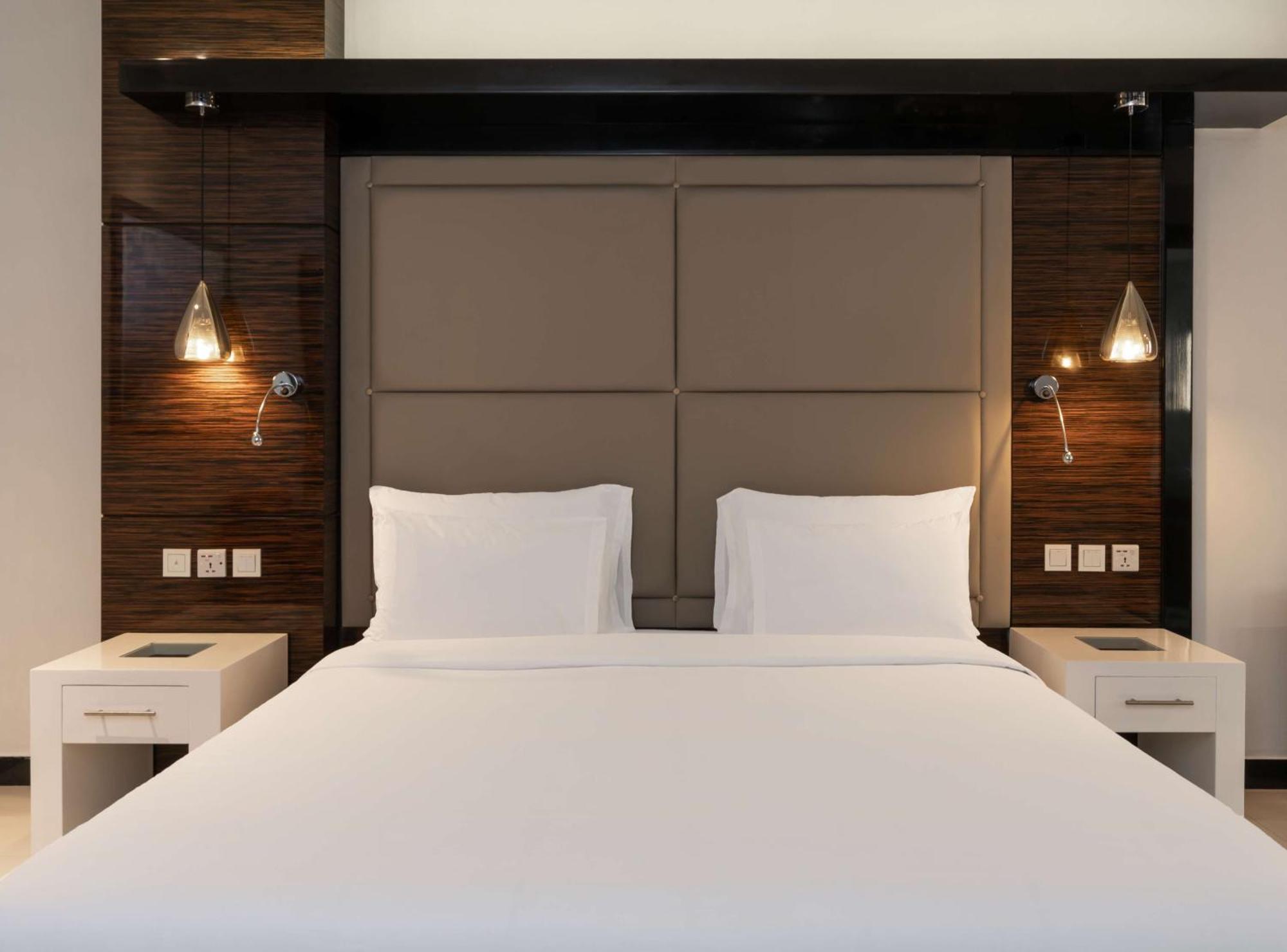 Radisson Blu Hotel Lusaka Exterior photo A bedroom at the hotel